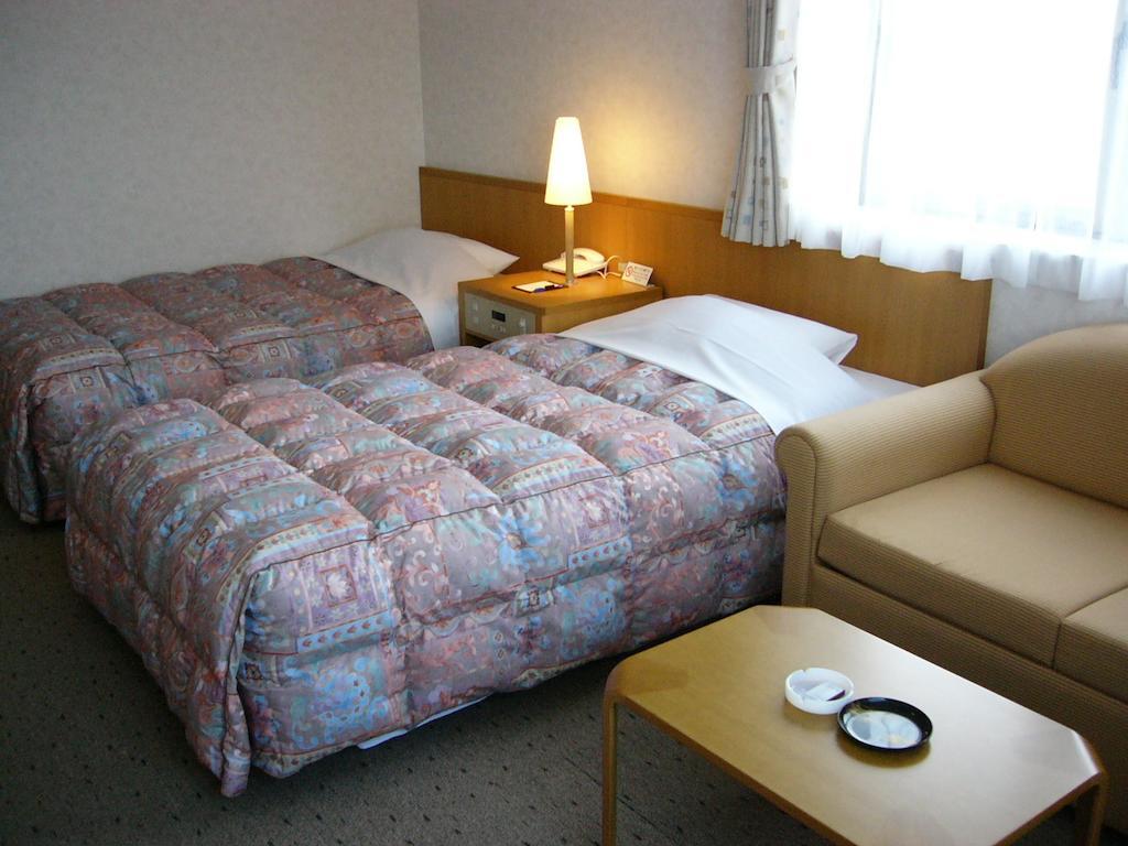 Hotel Okabe Shiosaitei Ваканай Стая снимка