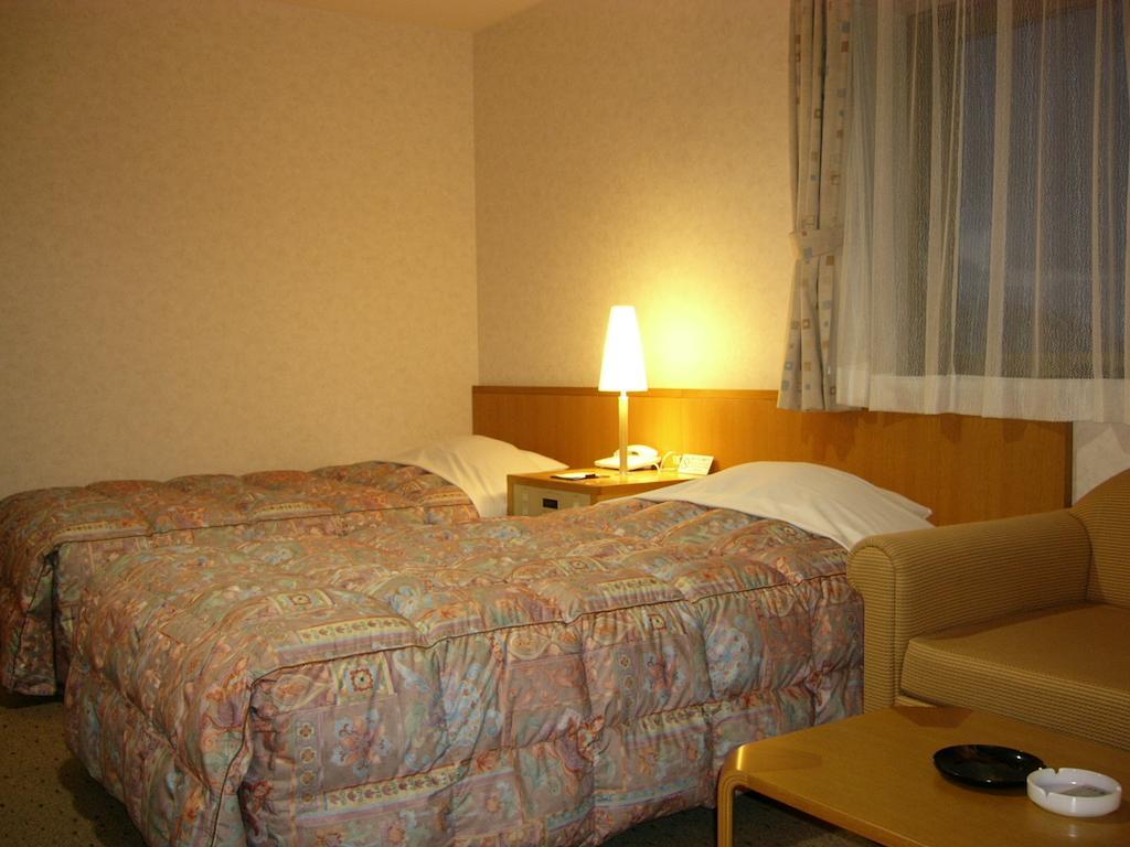 Hotel Okabe Shiosaitei Ваканай Стая снимка